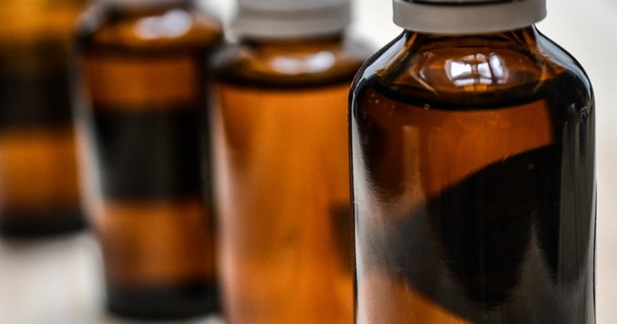 Rows of amber herbal tincture bottles